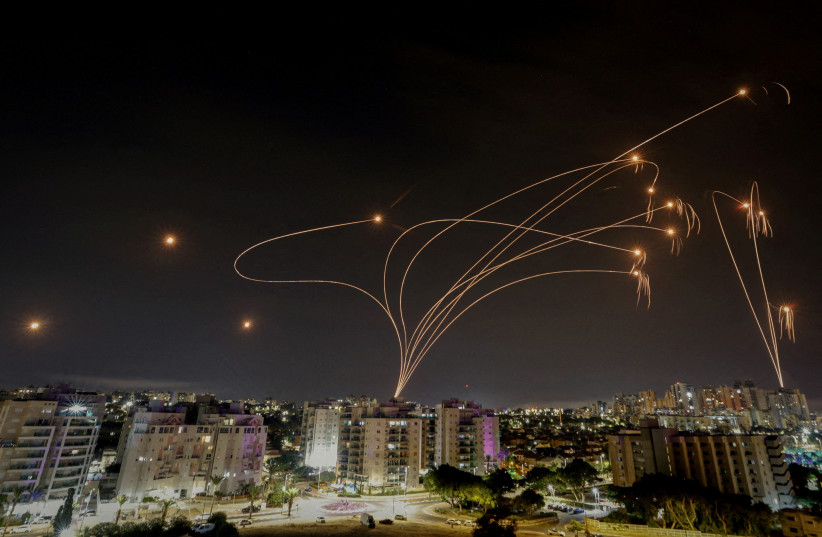 Israel's Iron Dome anti-missile system intercepts rockets launched from the Gaza Strip, as seen from the city of Ashkelon, Israel, October 9, 2023.