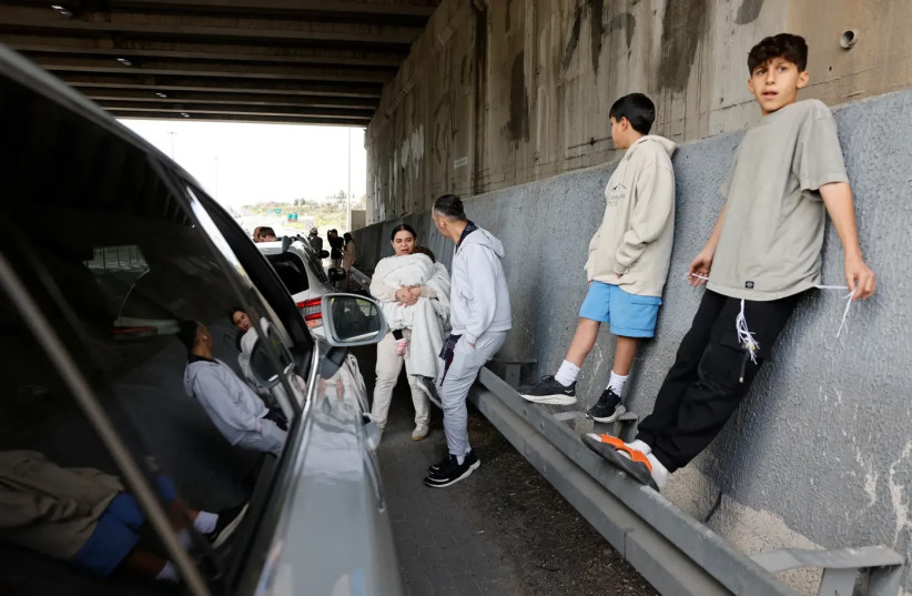 A frightening situation. People during a siren on the road (those photographed are not related to the article)