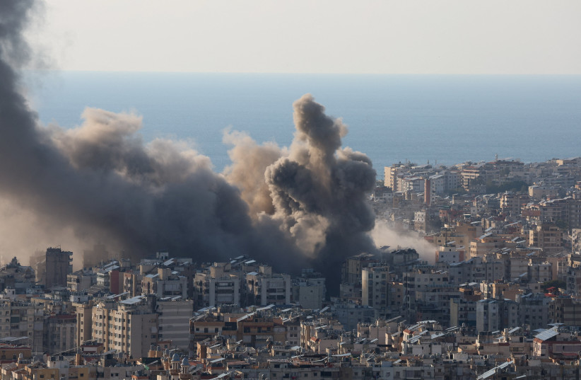 Smoke and dust rise after an Israeli strike on Beirut's southern suburbs, following an escalation between Hezbollah and Israel, Lebanon, March 2, 2026
