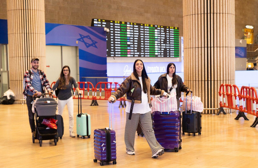 ISRAELIS RETURN in the first El Al flight to Israel since the beginning of Operation Roaring Lion, March 5, 2026.