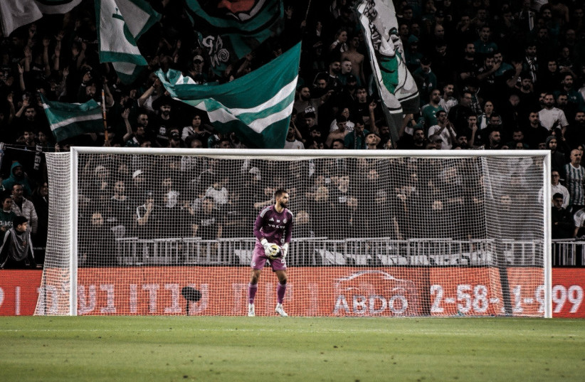 MACCABI HAIFA goalkeeper Georgiy Yermakov remains in Israel during the league’s wartime pause, while balancing the reality of conflict in both his homeland of Ukraine and his adopted home.