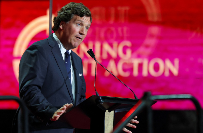 Political commentator Tucker Carlson speaks during a memorial service for slain conservative commentator Charlie Kirk at State Farm Stadium, in Glendale, Arizona, US, September 21, 2025.