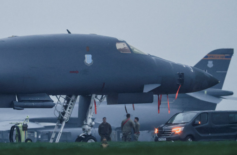 United States Air Force (USAF) military personnel work on a USAF B-1B bomber, at RAF Fairford airbase, amid the U.S.–Israeli conflict with Iran, in Fairford, Britain, March 8, 2026.