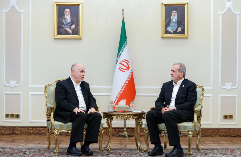 Iranian President Masoud Pezeshkian meets with the head of the Political Council of Hamas, Mohammed Ismail Darwish, in Tehran, Iran, February 8, 2025; illustrative. (credit: IRAN'S PRESIDENTIAL WEBSITE/WANA