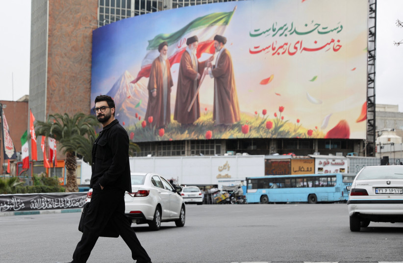 A banner of Iran's new supreme leader Mojtaba Khamenei with former supreme leaders Ali Khamenei and Ruhollah Khomeini, in Tehran, Iran, March 10, 2026 (credit: MAJID ASGARIPOUR/WANA
