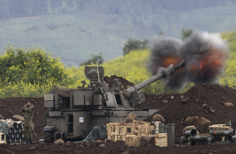 An Israeli artillery unit fires towards Southern Lebanon as seen from a position on the Israeli side of the border on March 15, 2026 in Northern Israel.