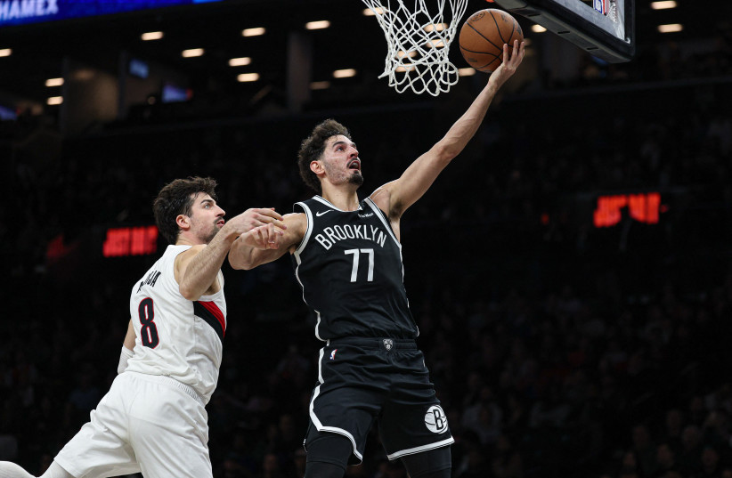 BROOKLYN NETS rookie guard Ben Saraf drives for a layup against fellow Israeli Deni Avdija of the Portland Trail Blazers during their teams’ duel in New York.