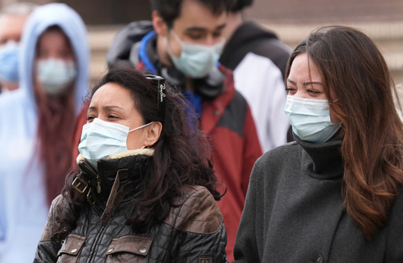Students queuing for antibiotics outside a building at the University of Kent in Canterbury on March 17, 2026.