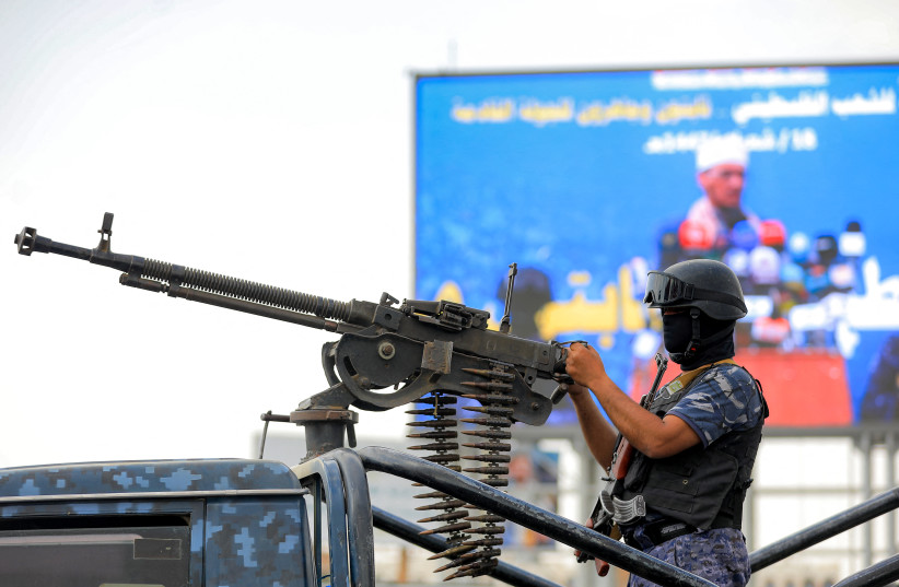 A member of security forces loyal to Yemen's Houthis mans a turret while on guard during an anti-Israel and pro-Palestinian rally in the Houthi-held capital Sanaa on February 6, 2026.