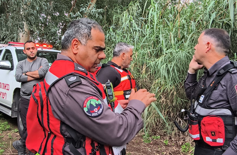 Emergency workers retrieve the body of an IDF reservist who died saving his drowning son on March 24, 2026.