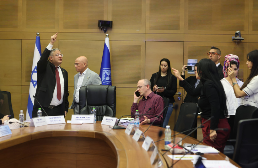 Minister of National Security Itamar Ben-Gvir discusses with MK Yasmin Friedman (Yesh Atid), who is against the death penalty bill in a Knesset plenum in Jerusalem. March 24, 2026.
