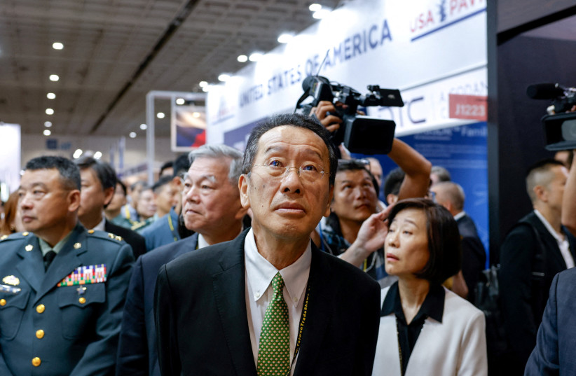 Taiwan’s Defence Minister Wellington Koo visits the United States pavilion during the Taipei Aerospace and Defence Technology Exhibition in Taipei, Taiwan, September 18, 2025.