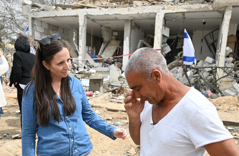 Keren Hayesod CEO Edna Weinstock-Gabay on a visit this week to Dimona with Dudu Ezran near his house that was destroyed by a missile strike from Iran