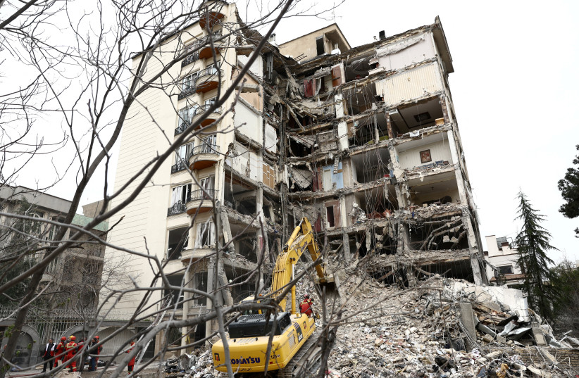 A view of a residential building damaged by a strike, amid the US-Israeli conflict with Iran, in Tehran, Iran, March 23, 2026.