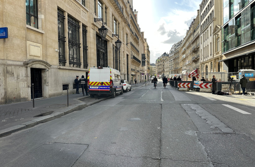 A police van is seen outside the building housing Bank of America’s offices, after French anti-terrorism prosecutors opened an investigation into a suspected attack on the premises in Paris, France, March 28, 2026.