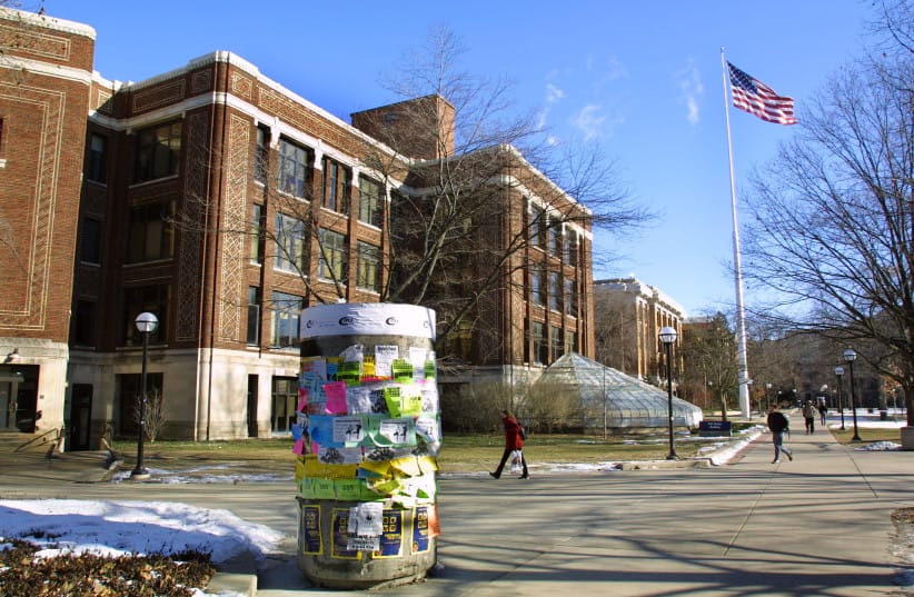 Students walk across the University of Michigan campus January 17, 2003 in Ann Arbor, Michigan.