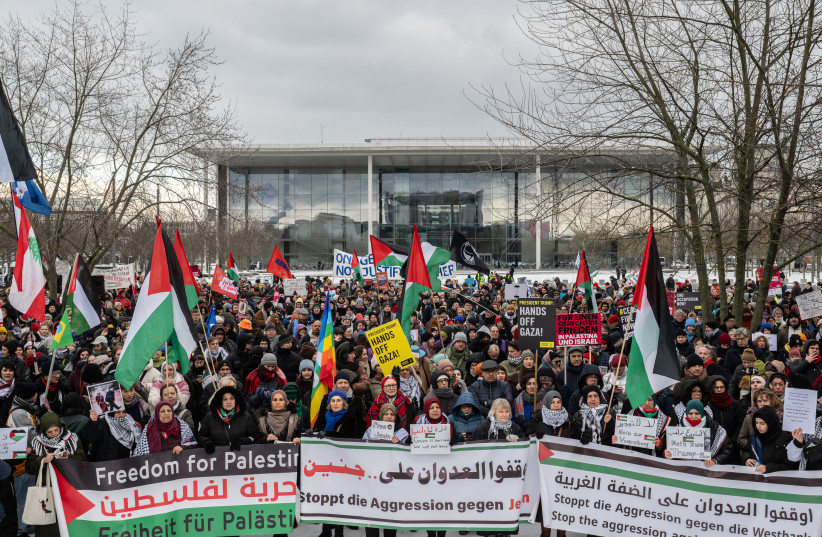 Pro-Palestine demonstrators attend a rally against Israeli aggression called by Amnesty International and others near the Bundestag on February 15, 2025 in Berlin, Germany.