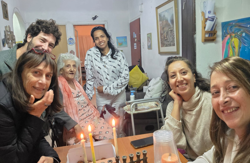 Jaffa Institute volunteers are seen supporting aging Holocaust survivors in low-income areas.