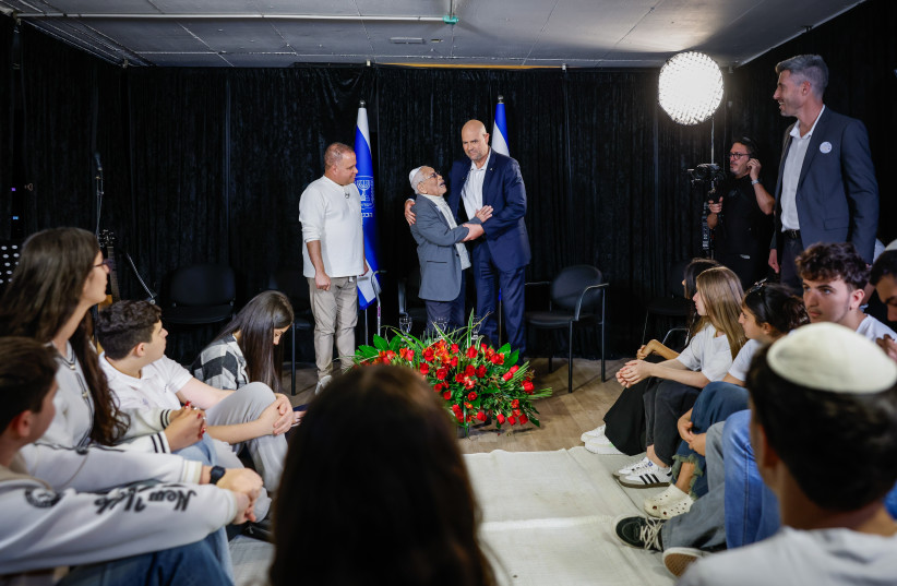 Knesset Speaker Amir Ohana and Holocaust survivor Yeshayahu Foyer.