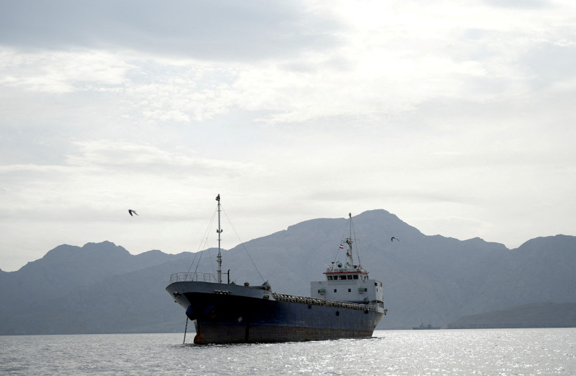 A vessel in the Strait of Hormuz, off the coast of Oman’s Musandam province, April 12, 2026.
