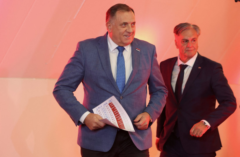 Milorad Dodik, former President of the Bosnian Serb Republic, and Sinisa Karan attend a press conference after preliminary results indicated Karan won a snap presidential election in Banja Luka, Bosnia and Herzegovina, November 23, 2025.