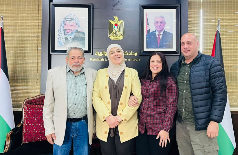 RAMALLAH GOVERNER Laila Ghannam with a freed Fatah member.