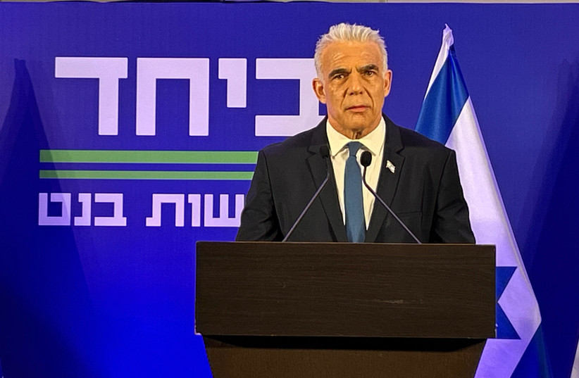 Former PM and opposition leader Yair Lapid speaks at the launch of a joint list party led by former PM Naftali Bennett, April 26, 2026.