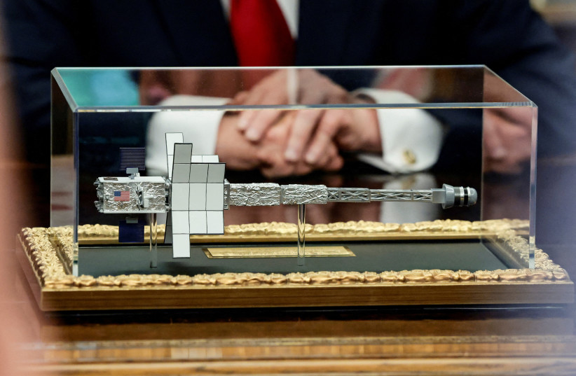 A model of the Space Reactor-1 Freedom sits on the desk while U.S. President Donald Trump takes questions from the media during an event with Artemis II astronauts in the Oval Office at the White House in Washington, DC, US, April 29, 2026. (credit: REUTERS/EVELYN HOCKSTEIN)