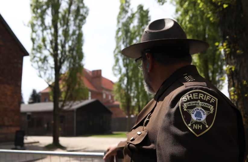 A sheriff with a New Hampshire patch takes part in the March of the Living at Auschwitz on April 24, 2025, in Oswiecim, Poland.