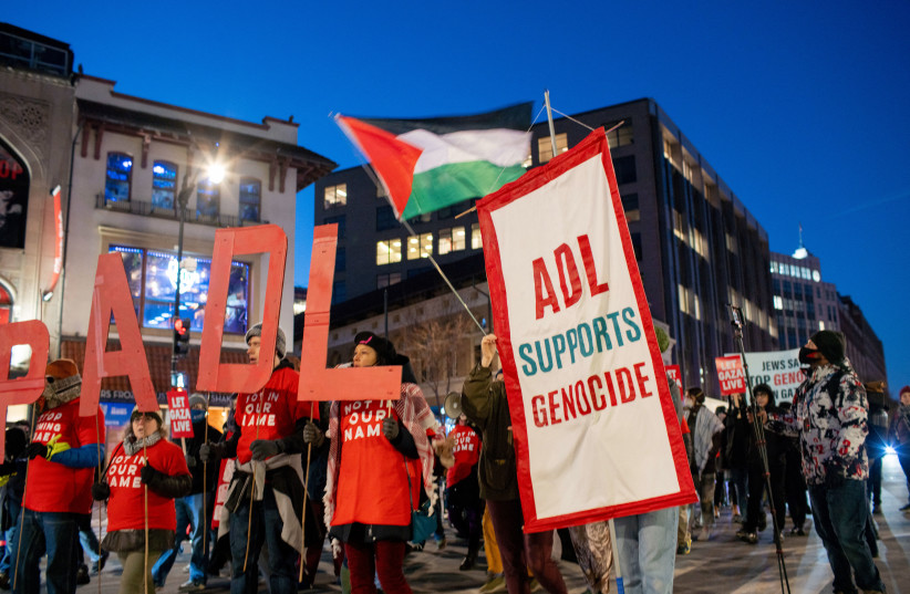 The Jewish-Palestinian solidarity group Jewish Voice for Peace held a march to protest Israel's war crimes in Gaza, as well as condemn the Anti-Defamation League in downtown Washington, D.C. (credit: KIA RASTAR/Middle East Images/AFP via Getty Images)
