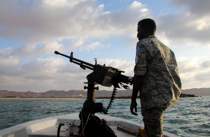 STRATEGIC CHOKEPOINT: A Puntland Marine officer patrols the Bosasso coastline in the Red Sea against ISIS, in Bari Region in the Gulf of Aden, Somalia, Jan. 2025.