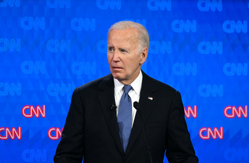 Former US president Joe Biden looks on as he participates in the first presidential debate of the 2024 elections with US President (then-Republican presidential candidate) Donald Trump at CNN's studios in Atlanta, Georgia, on June 27, 2024.