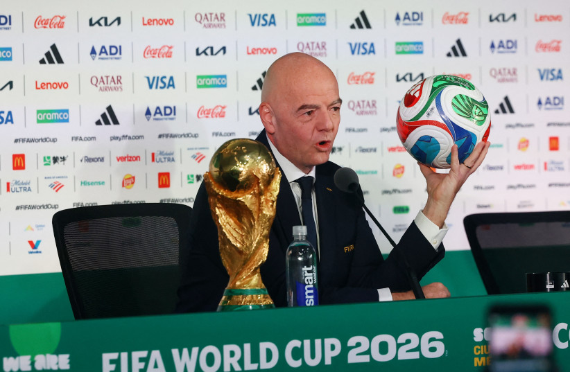 FIFA President Gianni Infantino Press Conference - Estadio Azteca, Mexico City, Mexico - June 10, 2026 FIFA President Gianni Infantino with the FIFA World Cup trophy during the press conference.