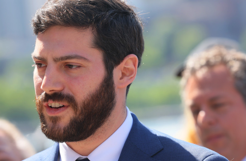 Assembly member Alex Bores speaks during a press conference on the Climate Change Superfund Act at Pier 17 on May 26, 2023 in New York City. Rep. Daniel Goldman (D-NY) and Jerry Nadler (D-NY) were joined by state lawmakers, including State Sen. Liz Krueger the author of the Climate Change Superfund