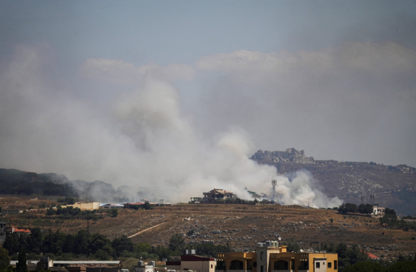 Smoke billows from southern Lebanon following an Israeli strike, as seen from Kfartibnit, Lebanon, June 19, 2026.