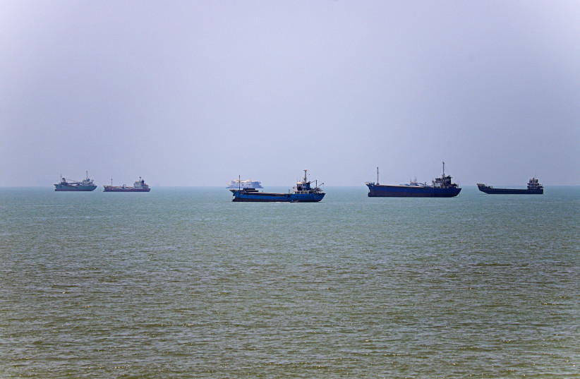 In this picture obtained from Iran's ISNA news agency on June 18, 2026, vessels are seen anchored in Bandar Abbas along the Strait of Hormuz.