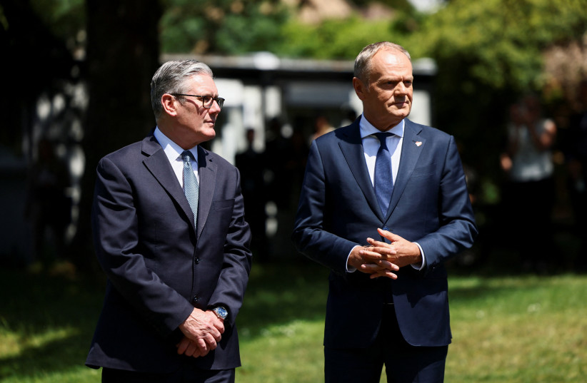 Britain's Prime Minister Keir Starmer and Poland's Prime Minister Donald Tusk meet with Polish and British military personnel at the Battle of Britain Bunker, as the countries formalise a UK-Poland security agreement, in Uxbridge, Britain, May 27, 2026.