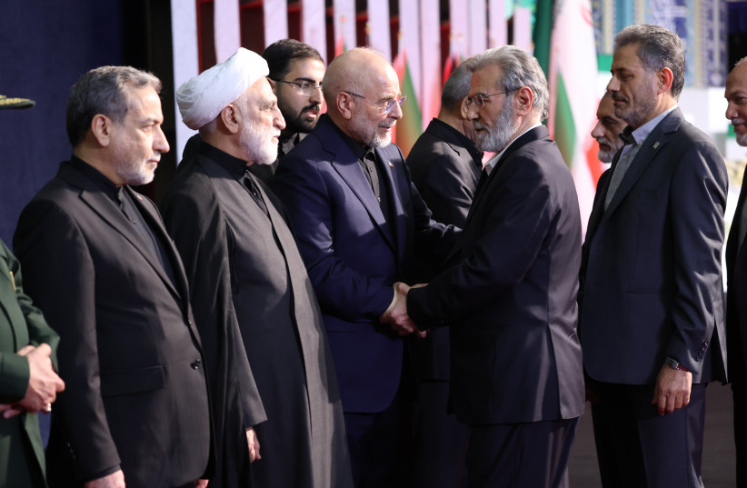 In this image released on July 4, 2026, Secretary-General of the Islamic Jihad Movement in Palestine Ziyad al-Nokhaleh shakes hands with Iranian Parliament Speaker Mohammad Bagher Ghalibaf, and next to him are Chief Justice of Iran Gholam-Hossein Mohseni-Eje’i and Iranian Foreign Minister Araghchi.