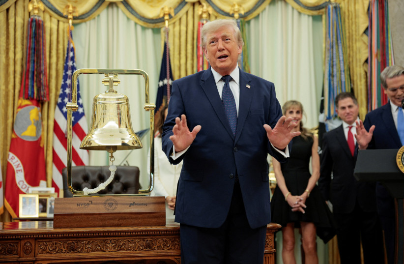 US President Donald Trump gestures after ringing the opening bell for the New York Stock Exchange (NYSE) and Nasdaq during an event to mark the launch of ''Trump Accounts'' in the Oval Office at the White House in Washington, July 6, 2026.