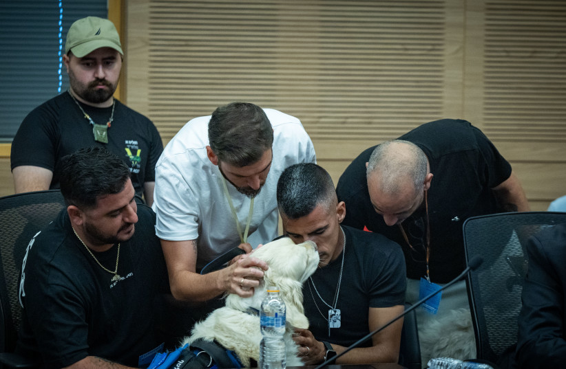 Combat veterans suffering from PTSD attends a House committee meeting at the Knesset, the Israeli Parliament in Jerusalem on, July 7, 2026.