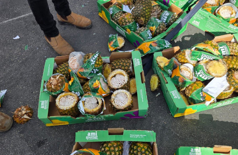Pineapples filled with cigarettes intended to be smuggled across the border into Gaza.