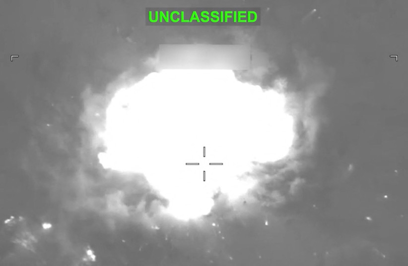 Fire and smoke rise from explosions at an unknown location, following what US Central Command (CENTCOM) said were strikes on Iranian military targets, in this screen grab from a video released on July 8, 2026.