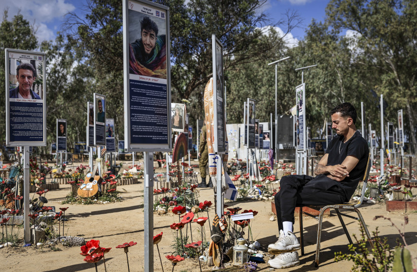 Bereaved families, friends, and Israeli soldiers visit the Nova music festival massacre memorial site in Re’im Forest, near the Israel-Gaza border, during Israel’s Memorial Day, April 21, 2026.
