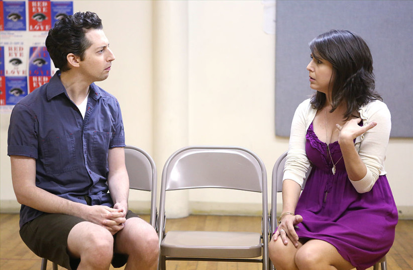 Josh Grisetti and Alli Mauzey during a rehearsal for 'Red Eye of Love' at Studio353 on August 7, 2014 in New York City.