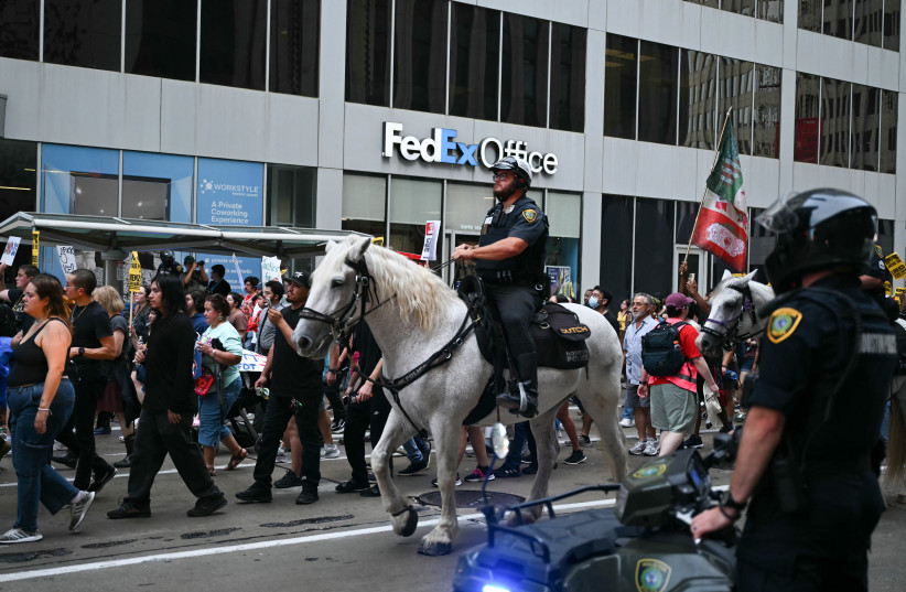Mounted police officers follow the ''Justice for Lorenzo'' protest against the US Immigration and Customs Enforcement (ICE) for the killing of Mexican migrant Lorenzo Salgado Araujo, in downtown Houston, Texas, on July 11, 2026.