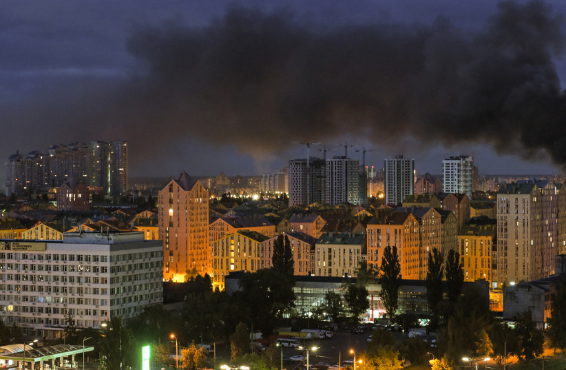 This photo shows smoke rising during Russian missile strikes on the Ukrainian capital of Kyiv early on July 11, 2026, amid the Russian invasion in Ukraine. Ukraine said Russian missile strikes on Kyiv wounded six people, as Moscow escalates attacks on the Ukrainian capital.