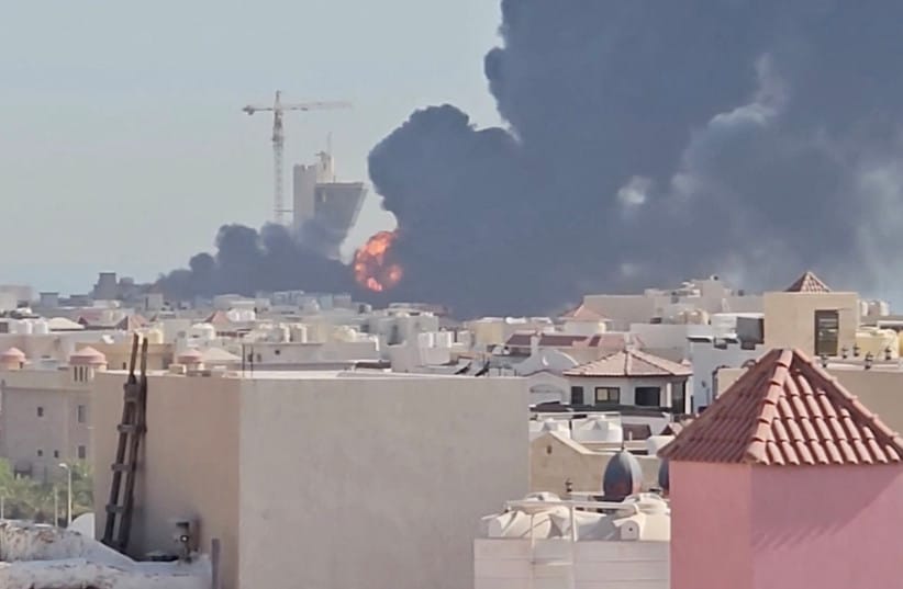 Smoke billows near the oil facility in Mangaf, Kuwait, July 18, 2026.