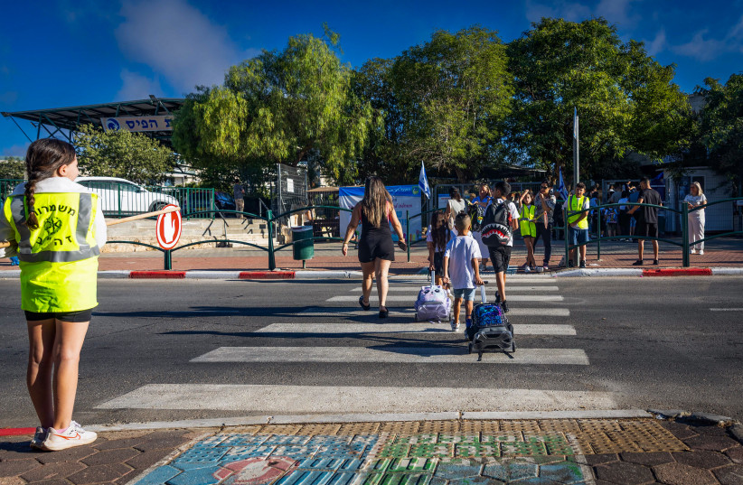 [ILLUSTRATIVE] Children arrive for the first day of school in the Israeli town of Mevaseret Zion, September 1, 2025.
