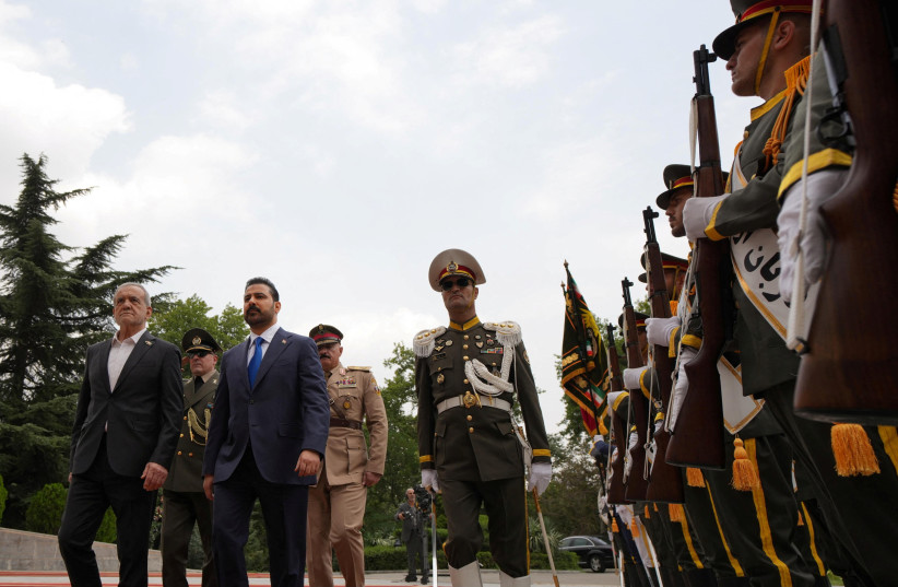 Iraqi Prime Minister Ali al-Zaidi and Iranian President Masoud Pezeshkian attend a welcoming ceremony in Tehran, Iran July 23, 2026.