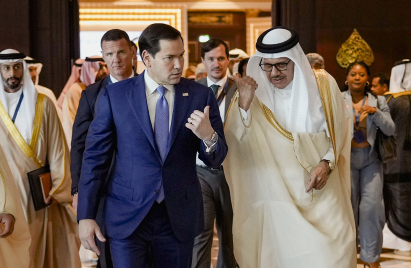 US Secretary of State Marco Rubio (L) walks along side Bahrain's Foreign Minister and Chairman of the GCC Ministerial Council session Abdullatif bin Rashid al-Zayani following a meeting with foreign ministers of the Gulf Cooperation Council Member States (GCC), in Manama on June 25, 2026